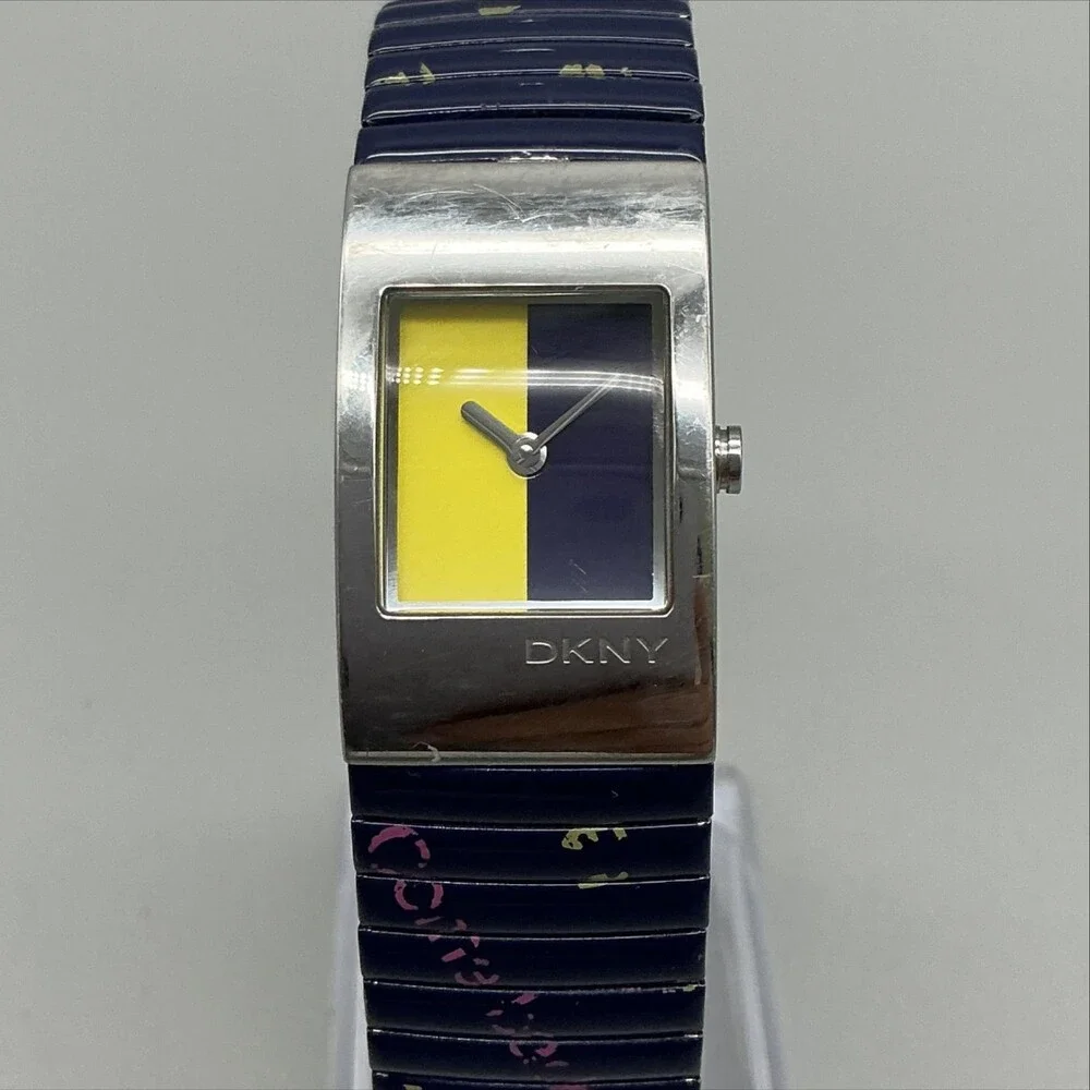 DKNY Womens Watch 19mm Silver Tone Multicolor Dial Blue Stretch Band New Battery